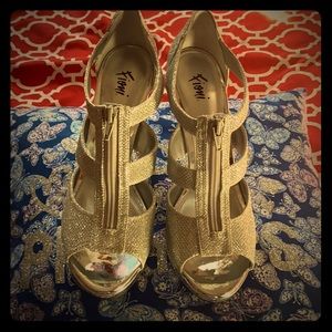 Silver high heel shoes are brand new